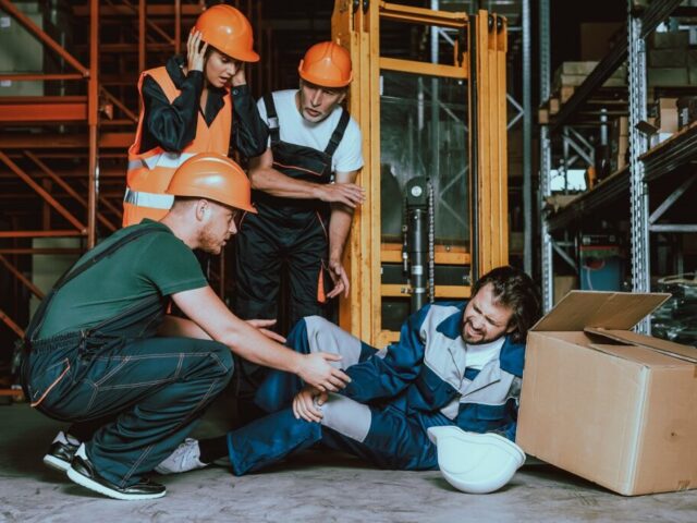 Young Warehouse Worker Injured Leg at Workplace